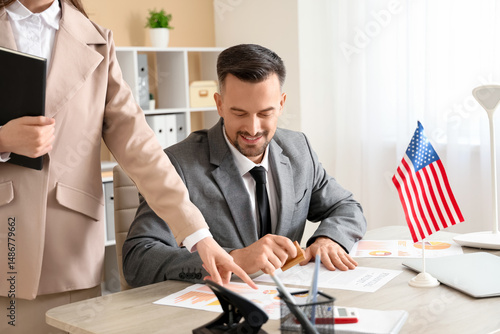 Handsome young man and fema...