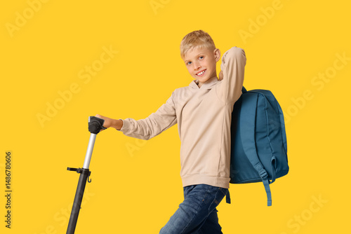 Cute schoolboy with modern ...