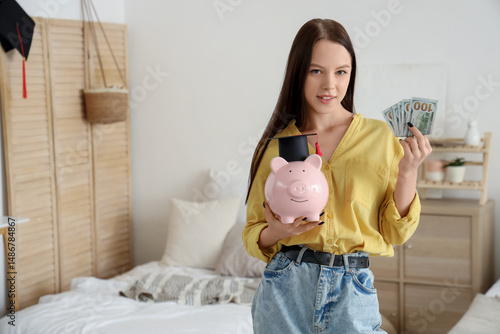Young woman with savings fo...