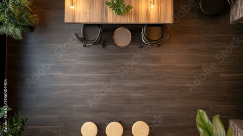 Overhead view of a dining table with chairs and stools