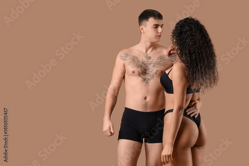 Young couple in stylish und...