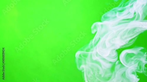 Wispy Vapor Dance: Soft, white vapor gracefully swirls against a vibrant, vivid green backdrop, a dynamic interplay of texture, light and form. creating abstract sensation of tranquility and serenity.
