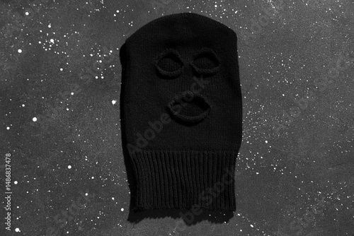 Fototapeta Black balaclava on dark background