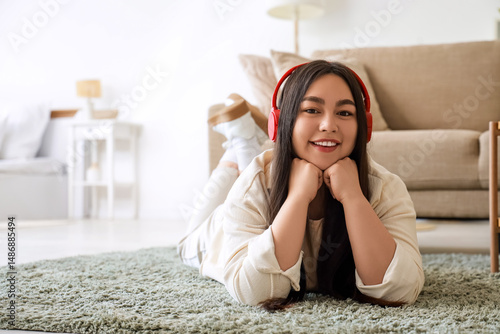 Young woman in headphones l...