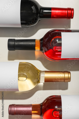 Bottles of different wine w...