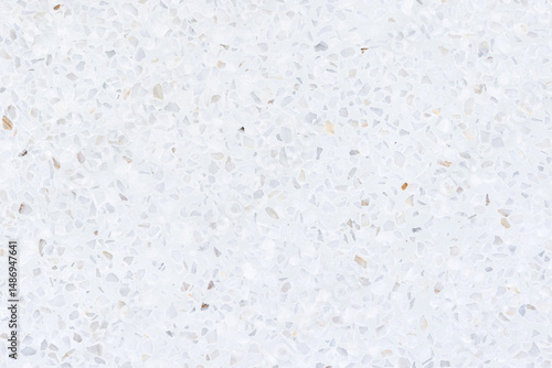 Terrazzo seamless texture background. New clean white bright and shiny surface. Small gravel mixed with mortar cement. Polished smooth for flooring, wall or cladding to decoration interior exterior.