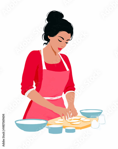 Hispanic woman baking cookies