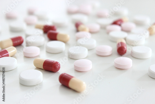 Drug tablet and capsule isolated on the white background
