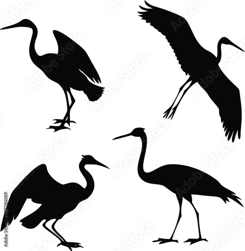 Four stylized crane silhouettes depict diverse poses against a plain white background in this artful image