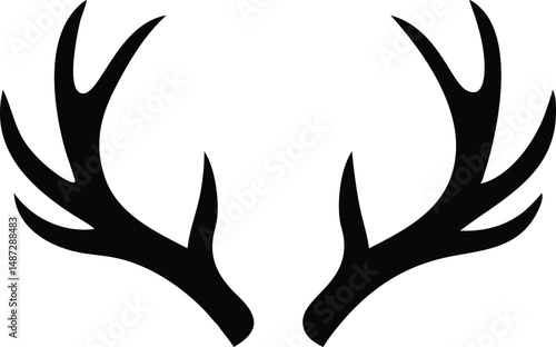 Isolated black silhouette showcases majestic symmetrical deer antlers gracefully curving on a white backdrop