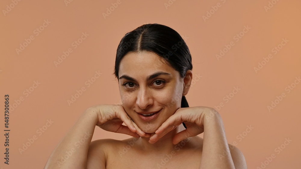 Smiling Woman with Dark Hair and Neutral Background Pose Smiling Woman with Dark Hair and Neutral Background Pose
