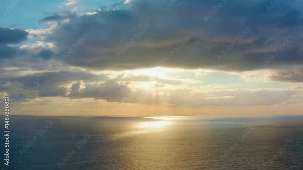 Ocean Reflecting Golden Sunset Light Under Cloudy Sky Aerial Ocean Reflecting Golden Sunset Light Under Cloudy Sky Aerial