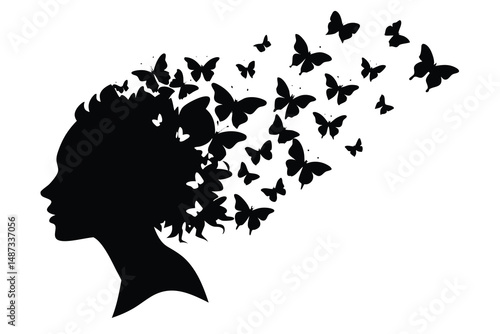 Black silhouette portrait reveals butterflies fluttering from a woman's head against a white backdrop