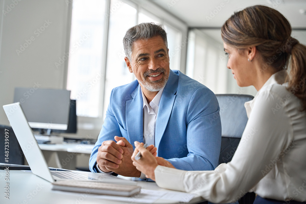 © insta_photos - Busy confident business woman professional bank manager lawyer attorney consulting client on finances management. Female executive speaking to male partner working at office corporate meeting.