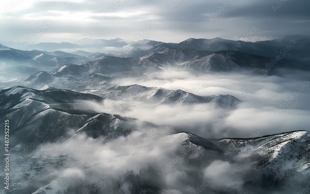 Fototapeta premium Majestic Mountain Ranges Covered in Clouds