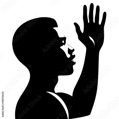 Man raising hand in silhouette symbolizing freedom and protest
