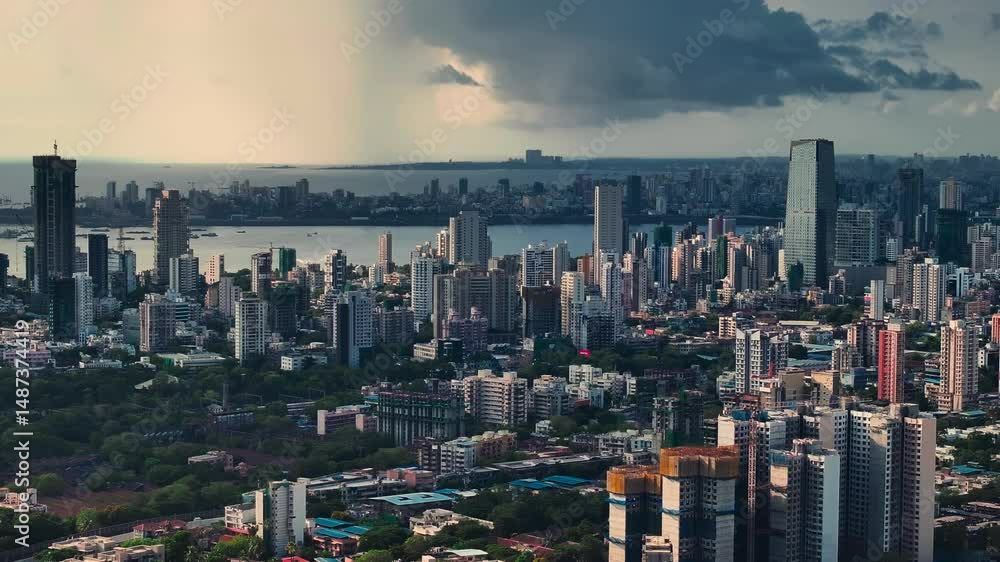 Modern City high-rise skyscraper buildings. Aerial drone view of the Financial District in Mumbai. Beautiful cloudy weather during the monsoon season in Mumbai, India. Lalbag-Parel view.