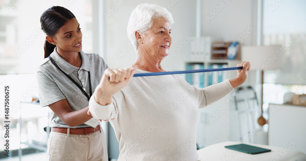 Fototapeta premium Senior woman, physiotherapist and resistance band with help, smile and healthcare services for recovery. People, happy and exercise with equipment, stretching and injury for rehabilitation at clinic