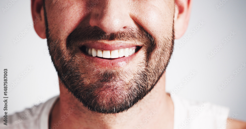 Fototapeta premium Dentistry, mouth and smile of man in studio closeup for dental health, oral hygiene or teeth whitening. Aesthetic, beard and veneers implant with happy person on white background for tooth care