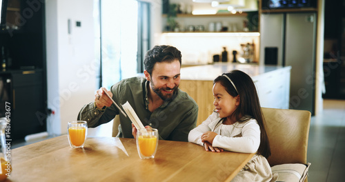 Card, education and dad with daughter at home for learning, homework and teaching. Help, support and phonics lesson with man and child in family house for homeschool student and reading development