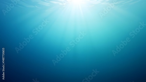 Bright sun rays burst through the blue underwater, creating a sunny sea scene
