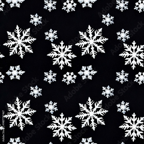 fallen snowflakes on a dark velvet background