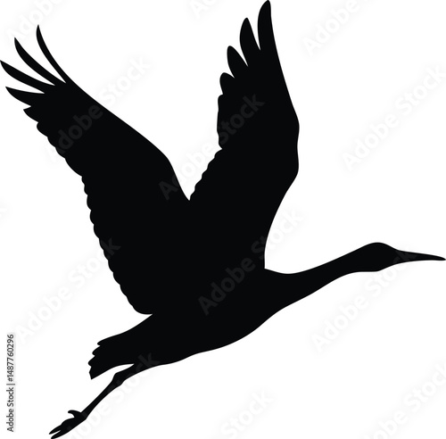 a black silhouette of a crane in flight isolated white background