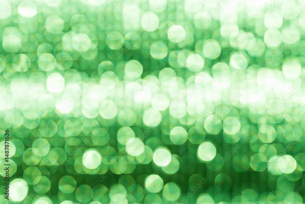 Abstract blurred green light bokeh background, festive season concept background, green bokeh pattern background Abstract blurred green light bokeh background, festive season concept background, green bokeh pattern background