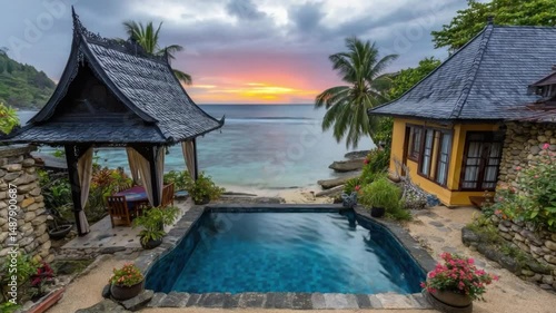 Wallpaper Mural Serene Seaside Villa with Infinity Pool at Sunset Surrounded by Lush Tropical Foliage and Vibrant Flowers Torontodigital.ca