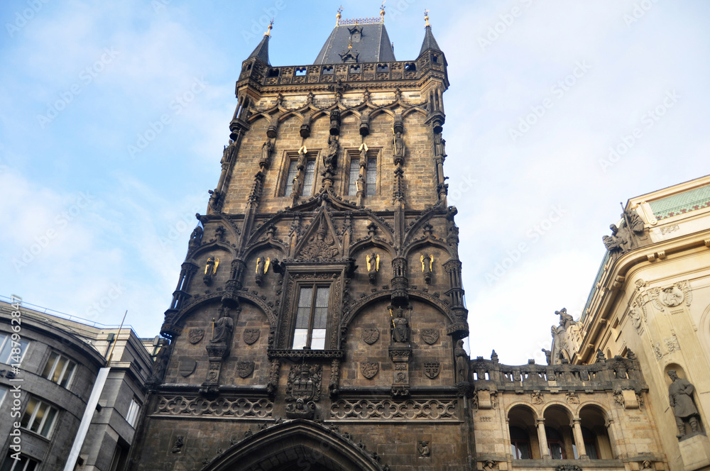 Obraz premium Czechia people and foreign travelers travel visit at classic ancient ruins antique building of The Powder Tower city gates entrance at Praha Old Town Square city in Prague, Czech Republic