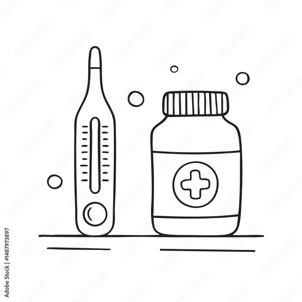 Fototapeta premium A thermometer beside a medicine bottle on the counter