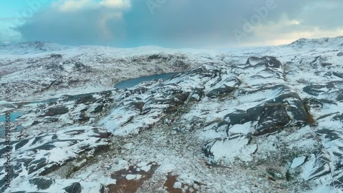 Breathtaking drone footage of Mount Otertinden in Norway, known for its sharp peaks resembling the Matterhorn, showcasing alpine beauty in the Lyngen Alps.