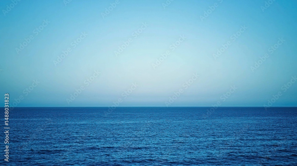 Obraz premium A clear sky gradient fading from light blue to deeper navy