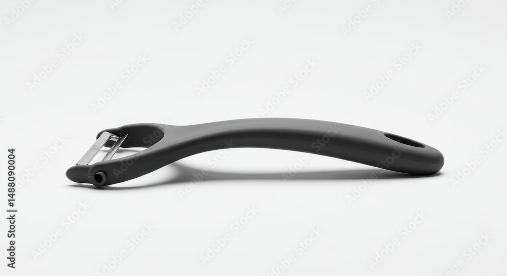 Obraz premium Modern Vegetable Peeler: Kitchen Utensil Simplicity
