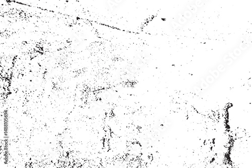 A white wall with black and gray spots and a black and white background.
