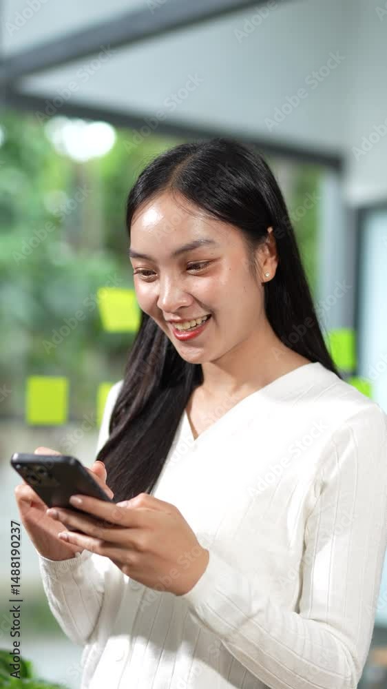 Asian woman is connecting to video chat on the internet using her smartphone to chat with her friend. Asian woman is connecting to video chat on the internet using her smartphone to chat with her friend.