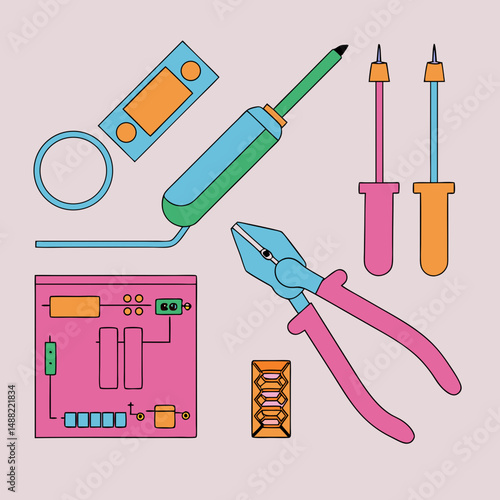 Colorful electronics repair tools and circuit board