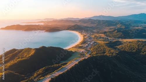 Aerial View of a Winding Coastline Cliff at Sunset