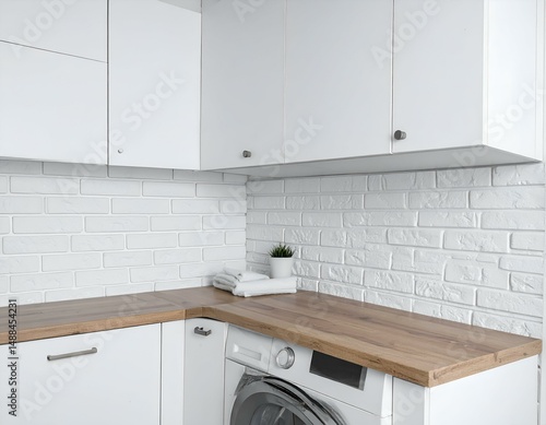Modern laundry room interior with white cabinets, wooden countertop, and white brick wall. Clean and minimalist design.