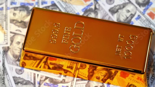 A gold bar on the background of dollars. Gold and foreign exchange reserves.
