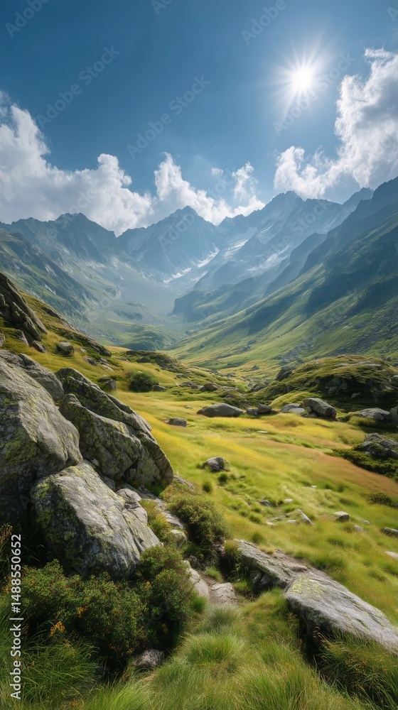 Fototapeta premium Majestic Mountains Under a Bright Sun With Lush Green Valleys and Rocky Formations