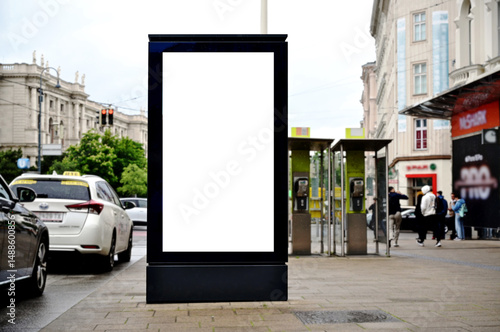 blank poster sign panel bus shelter. billboard mockup display. white lightbox sign in bus stop. digital panel. city transit station. urban street. park setting. outdoor advertising