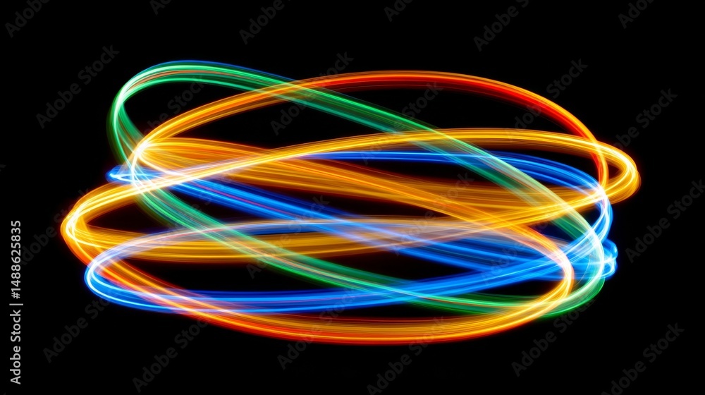 Colorful Light Trails Creating Dynamic Patterns Against a Black Background Conveying Energy and Movement Colorful Light Trails Creating Dynamic Patterns Against a Black Background Conveying Energy and Movement
