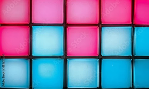 Abstract arrangement of glowing pink and blue squares creating a vibrant pattern