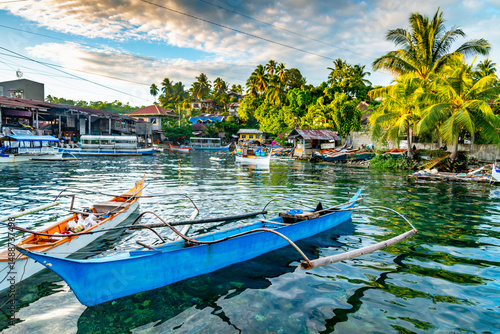 Barabo town,river neighborhood scenes at sunset, Mindanao Island,Surigao del Sur district,The Philippines.