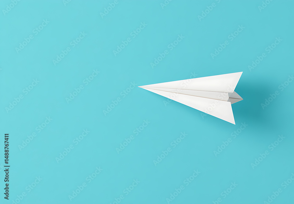 Paper airplane on a blue backdrop, symbolizing freedom and imagination. Clean, simple design conveys a sense of limitless possibilities and flight. Paper airplane on a blue backdrop, symbolizing freedom and imagination. Clean, simple design conveys a sense of limitless possibilities and flight.