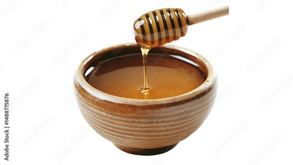 Honey dripping from a wooden honey stick into a bowl, isolated on a white background, cut out Honey dripping from a wooden honey stick into a bowl, isolated on a white background, cut out