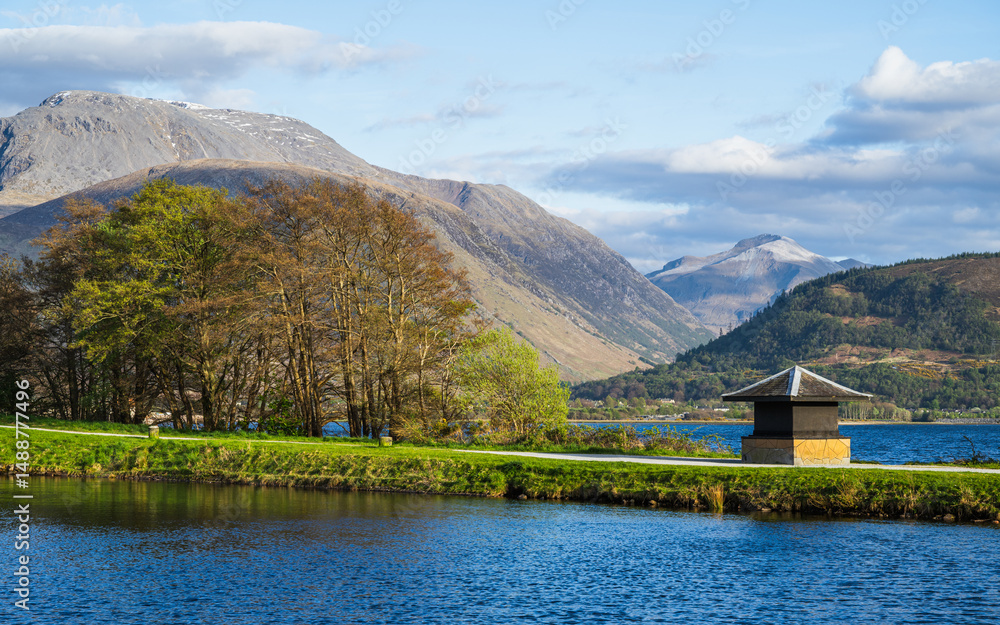 Fototapeta premium Caledonian Canal, Caol Beach and Nevis Range Mountains, Corpach, Fort William, Highland, Scotland, UK