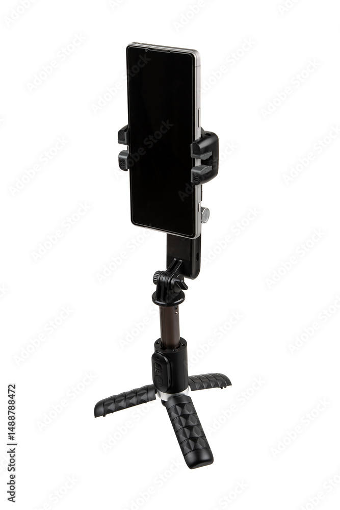Naklejka premium Smartphone mounted on compact gimbal stabilizer tripod, isolated on white back
