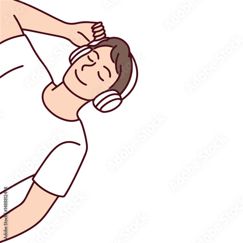 Young man peacefully lying down with eyes closed and headphones on, enjoying relaxing music or meditation, representing calmness, leisure, or emotional rest